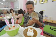 Bunny Cafe Japan Man Holding Bunny