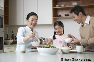 Thin Japanese Family Eating Together